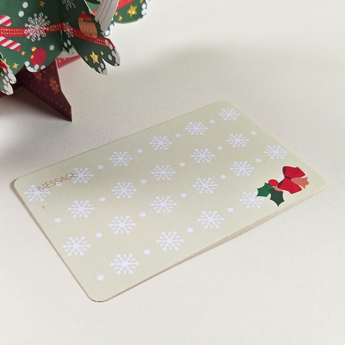 3D Christmas Tree Greeting Card with Hanging Snowflakes and Festive Paper Decorations