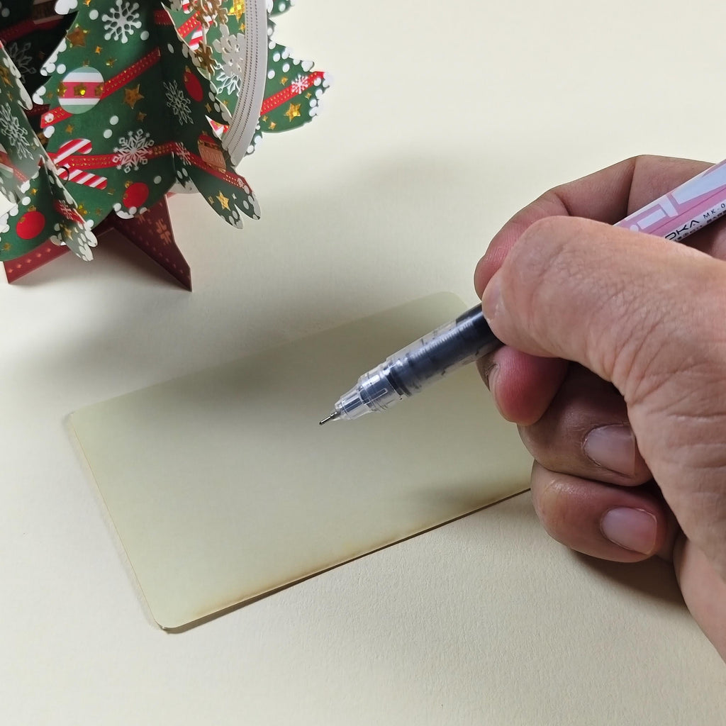 3D Christmas Tree Greeting Card with Hanging Snowflakes and Festive Paper Decorations